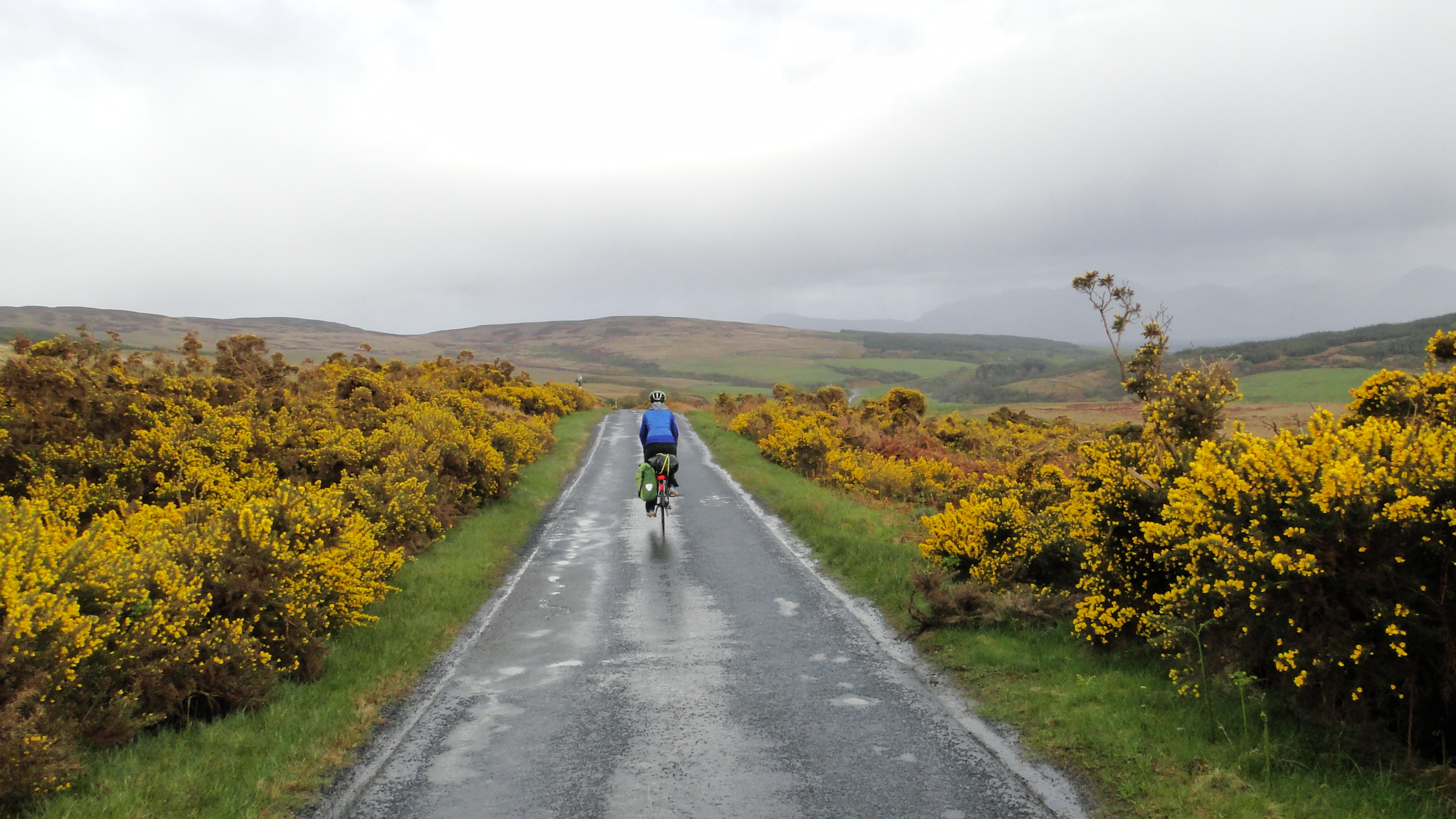 Here, you see my sister enjoying the cycling opportunity afforded by a typically sunny Scottish summer day.